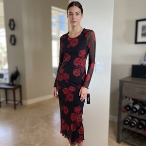 Bebe Bodycon Black Dress with Red Rose Print and sheer long sleeves NWT
